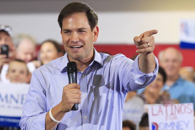 U.S. Sen. Marco Rubio speaks during a campaign event for Mitt Romney at Ronnow Elementary school, which Rubio attended from third through fifth grade, Saturday, July 28, 2012.