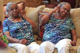 Twins Thelma Woods, left, and Velma McKenney celebrate their 90th birthday Saturday, July 28, 2012.