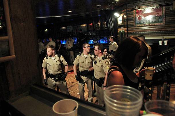 Metro officers guard a cordoned off area after a stabbing brought an early end to a Tenacious D concert at the House of Blues Saturday, July 28, 2012.
