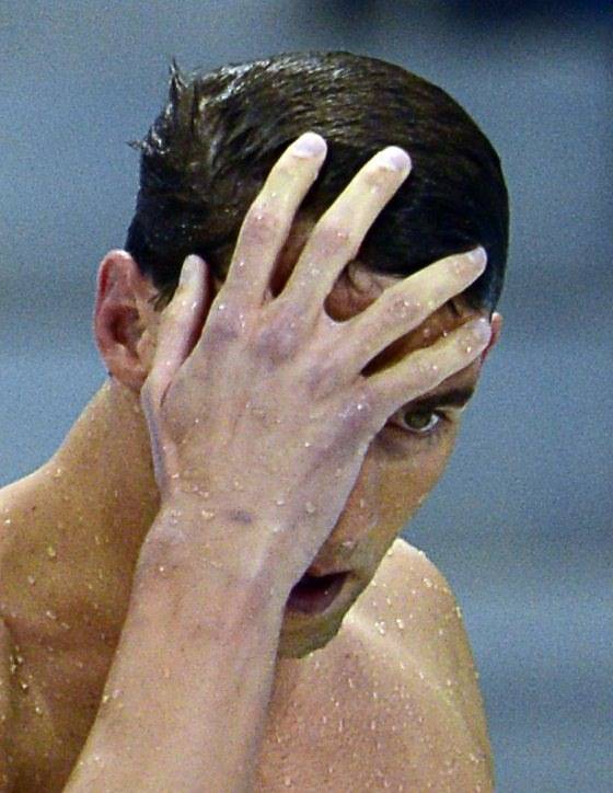 United States' Michael Phelps makes his way out of the pool after placing fourth in the men's 400-meter individual medley swimming final at the Aquatics Centre in the Olympic Park during the 2012 Summer Olympics in London, Saturday, July 28, 2012.