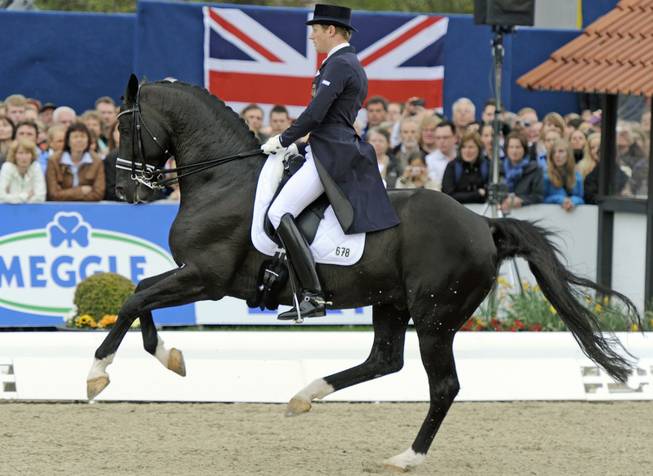 German Matthias Rath on horse Totilas performs his freestyle during the dressage riding Grand Prix International in Hagen, Germany, Sunday, April 29, 2012. 