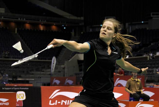 Germany's Juliane Schenk returns a shot to South Korea's Sung Ji Hyun at the Li-Ning Singapore Open Badminton tournament during their semi-finals match held on Saturday June 23, 2012 in Singapore. Schenk won the match 21-11 20-22 21-12. 