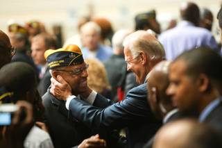 Vice President Joe Biden greets an attendee after Biden's speech at the Disabled American Veterans National Convention at Bally's Hotel Convention Center Saturday, August 4, 2012, in Las Vegas.