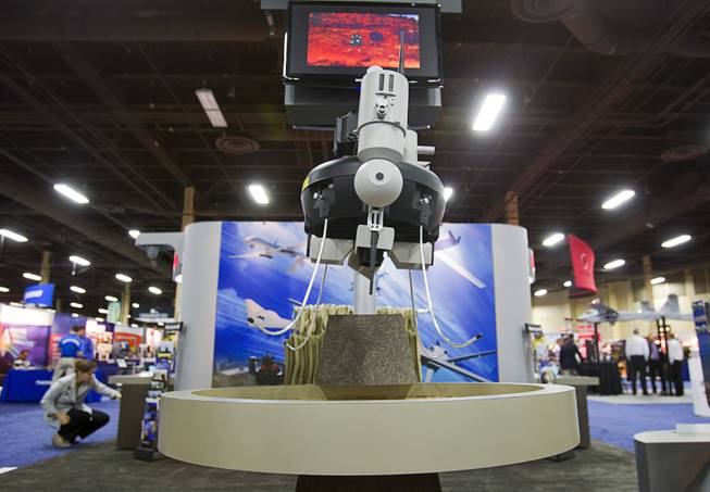 A Honeywell T-Hawk drone is displayed during the Association for Unmanned Vehicles Systems International (AUVSI) convention at the Mandalay Bay Thursday, Aug. 9, 2012. The reconnoissance drone can be carried in a backpack and has vertical take-off and landing capability.