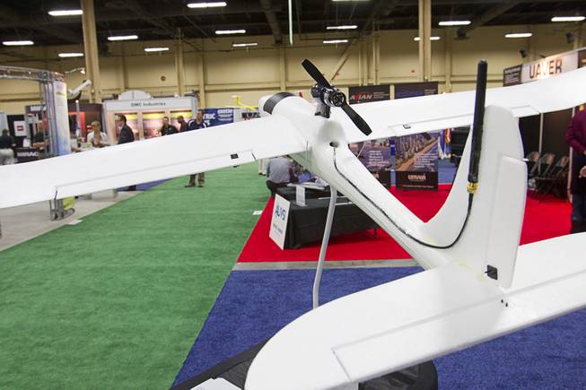 A plane with an Applewhite Aero autopilot system is displayed Thursday, Aug. 9, 2012, during the Association for Unmanned Vehicles Systems International convention at Mandalay Bay. The autopilot system has the potential to turn low-cost hobby planes into drones that can be used for basic research.