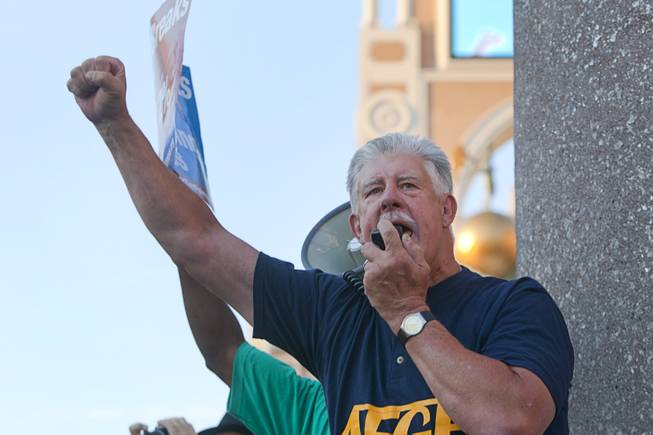 John Gage, national president for the American Federation of Government Employees (AFGE) union, rallies members as they picket against Republican vice presidential candidate Paul Ryan in front of the Venetian on the Las Vegas Strip Tuesday, Aug. 14, 2012. Ryan was reportedly meeting privately with a small group of supporters at the casino owned by Sheldon Adelson, a billionaire and major donor to Republican campaigns.