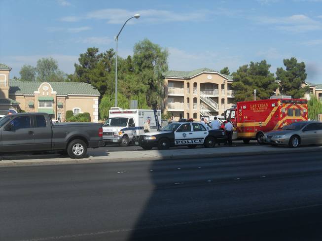 A woman is in custody after holding a child hostage at the Budget Suites at 2219 N. Rancho Drive on Saturday, July 14, 2012.