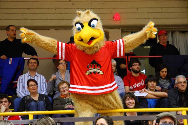 Victor, the mascot for the Rouge et Or of Laval University in Quebec City, Quebec, performs during a basketball game Feb. 17, 2012.
