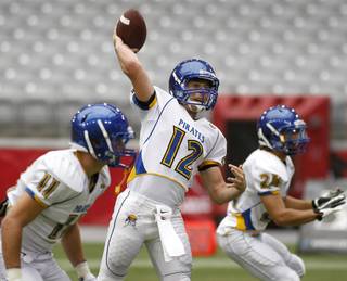 Moapa Valley quarterback Jake Repp throws a pass during pre-game warm-ups before the start of the 2012 AIA Sollenberger Classic football game against Blue Ridge on Saturday, Aug. 18, 2012 at University of Phoenix Stadium in Glendale, Ariz. (Ralph Freso for the Las Vegas Sun)