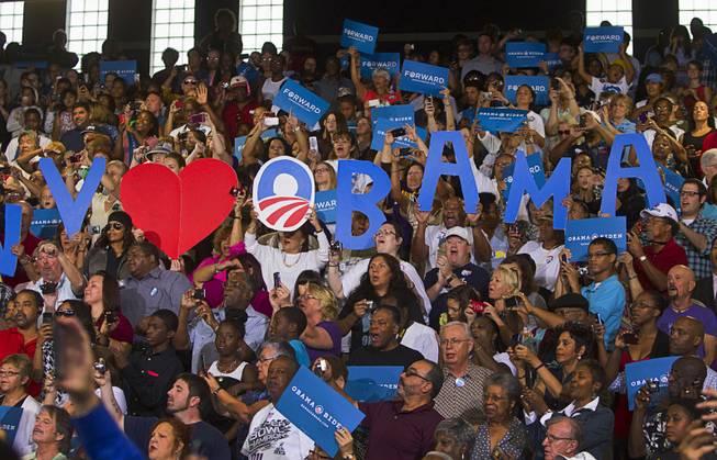 Supporters cheer as President Barack Obama as he is introduced at a rally at Canyon Springs High School in North Las Vegas Wednesday, Aug. 22, 2012.
