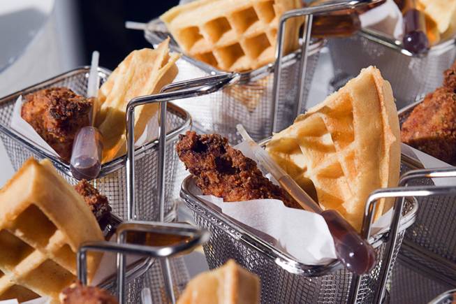 Baskets of fried chicken and waffles with syrup dispensers are displayed during a media preview of Bacchanal Buffet under construction at Caesars Palace on Tuesday, Aug. 28, 2012. Caesars hopes the $17 million, 25,000-square-foot buffet will set the new standard for Las Vegas buffets with more than 500 food items and seating for 600 guests.