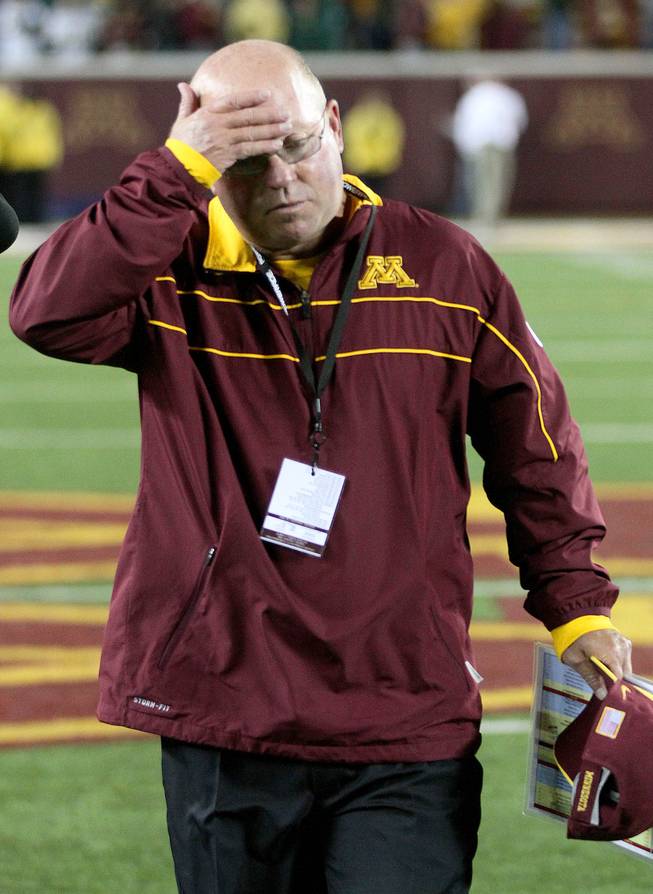 Minnesota coach Jerry Kill leaves the field after losing to North Dakota State 37-24 on Saturday, Sept. 24, 2011, in Minneapolis. Kill went 3-9 in his first season with the Gophers and opens his second season at UNLV at 8 p.m. on Thursday, Aug. 30, 2012.
