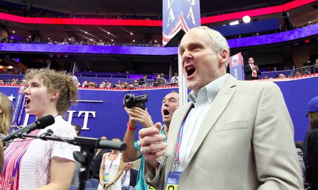 Nevada delegation chair Wayne Terhune and his daughter, delegation aide Jennifer Terhune scream their objections to the RNC rules on the convention hall floor, Aug. 28, 2012.
