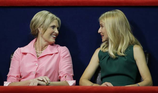 Ann Romney, left, wife of U.S. Republican presidential nominee Mitt Romney, chats with Republican vice presidential nominee Paul Ryan's wife, Janna, during the Republican National Convention in Tampa, Fla., on Wednesday, Aug. 29, 2012.