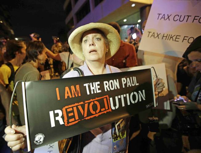 Ron Paul delegate Cynthia Kennedy of Nevada speaks during a protest, Wednesday, Aug. 29, 2012, in Tampa, Fla. Protestors gathered in Tampa to march in demonstration against the Republican National Convention.
