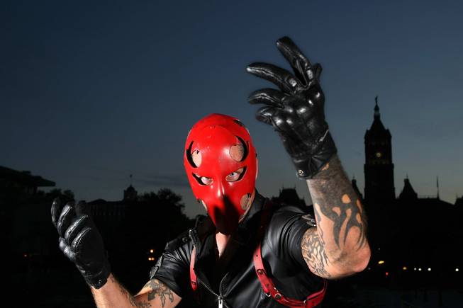 Dave Montgomery, 41, known as Nihilist, founder of the Black Monday Society, a group of people who get dressed up as superheroes and walk the streets of Salt Lake City at night, looking to stop crime from taking place, is photographed in his superhero outfit, August 9, 2012.