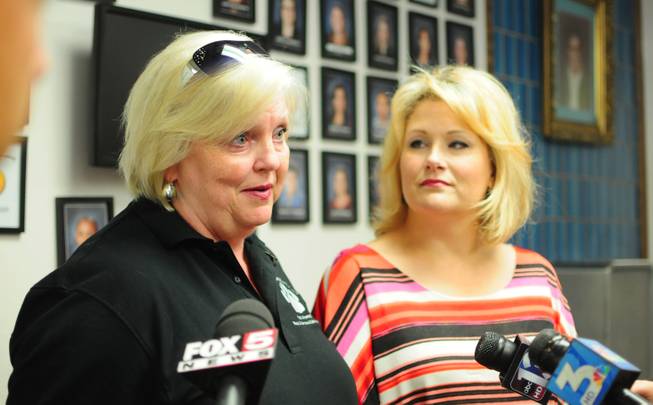Diskin Elementary School Principal Elizabeth Smith (left) speaks with the media about the logistics of temporarily transferring 700 students to nearby Decker Elementary School on Wednesday, Sept. 5, 2012, as Decker Principal Karen Johnson looks on. The air-conditioning system at the 39-year-old Diskin school, which was last renovated 13 years ago, failed on Tuesday, prompting school officials to temporarily close the school.