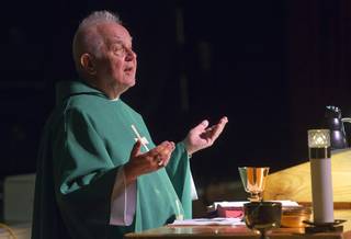 Father Charlie Urnick, of St. John the Baptist Catholic Church, conducts Mass at the Riverside Casino in Laughlin Sunday, Sept. 9. 2012. The church is the only Catholic church that holds weekly Mass in a casino, Urnick said.