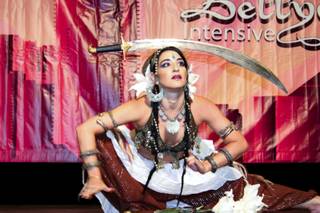 Silvia Salamanca from Mallorca, Spain, holds poses while balancing swords at the 10th Annual Bellydance Intensive & Festival that took place the weekend of Sept. 6, 2012.