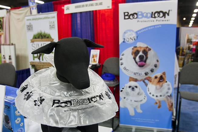 A BooBooLoon Protective Petwear recovery collar is displayed during SuperZoo, a trade show for the pet industry, at the Mandalay Bay Convention Center Tuesday, Sept. 11, 2012. The inflatable pet collar is more comfortable than hard cones and other rigid collars.