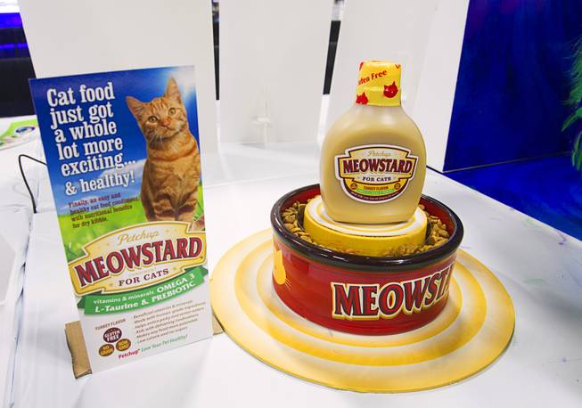 Meowstard cat condiment is displayed during SuperZoo, a trade show for the pet industry, at the Mandalay Bay Convention Center Tuesday, Sept. 11, 2012. The dietary supplement adds vitamins, minerals, L-Taurine and prebiotic to a cat's dry food.