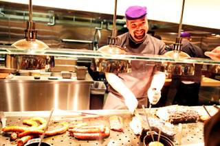 Tony Pettingill mans the carving station at Bacchanal Buffet in Caesars Palace on Tuesday, Sept. 11, 2012.