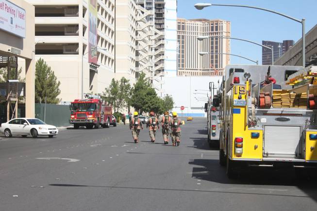 Firefighters are on the scene at Audrie Lane behind Planet Hollywood after reports of a fire at the hotel came in on Thursday, Sept. 13, 2012.