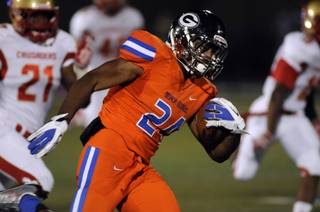 Gaels halfback Nathan Starks returns a kickoff for a touchdown during the first quarter against visiting Bergen Catholic High School at Bishop Gorman High School on Friday night.
