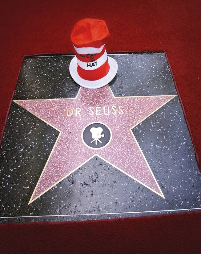 The hat worn by The Cat in the Hat, a creation of famed children's book author Theodor Seuss Geisel, better known as Dr. Seuss, adorns Dr. Seuss' posthumous star on the Hollywood Walk of Fame in Los Angeles' Hollywood district after dedicaton ceremonies Thursday, March 11, 2004. 