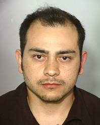 Daniel Esparza, 25, was arrested Friday for driving under the influence resulting in substantial bodily harm after he crashed his black BMW into a pair of police cruisers that had pulled over for a separate traffic stop. Two officers were sent to the hospital and released later in the day Friday.