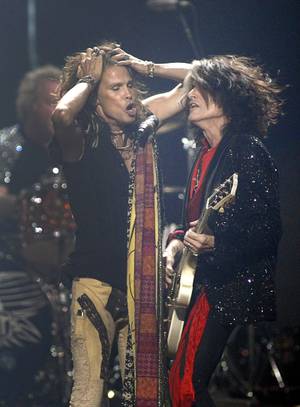 Steven Tyler and Joe Perry of Aerosmith perform during the second night of the 2012 iHeartRadio Music Festival at MGM Grand Garden Arena on Saturday, Sept. 22, 2012.