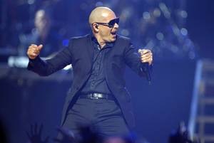Pitbull performs during the second night of the 2012 iHeartRadio Music Festival at MGM Grand Garden Arena on Saturday, Sept. 22, 2012.