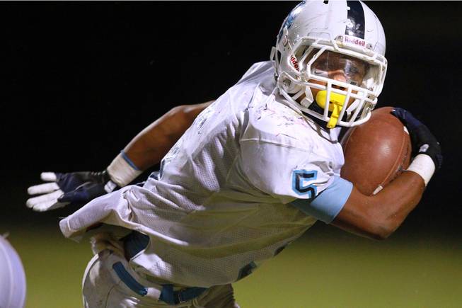 Canyon Springs running back D.J. Pumphries during their game against Liberty.