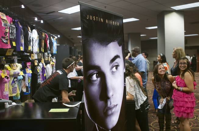 Justin Bieber fans line up for merchandise at the MGM Grand Garden Arena during a concert on September 30, 2012.