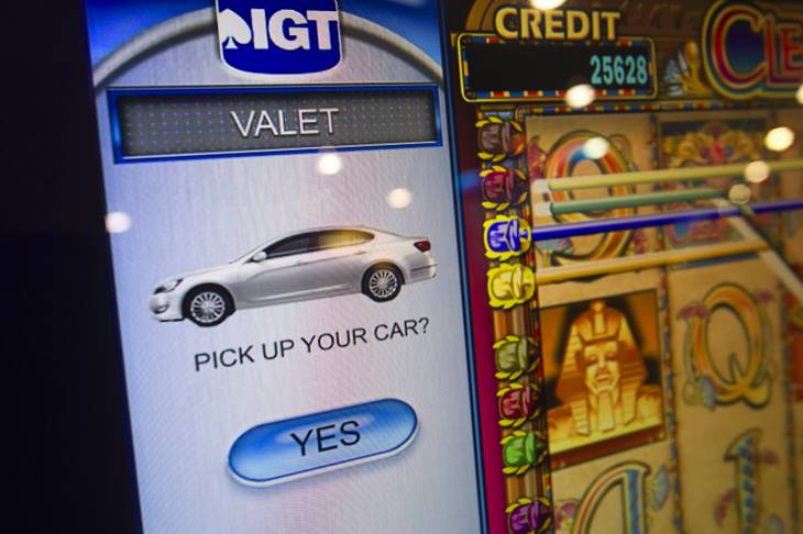 A side screen on an IGT machine that allows for a variety of services is displayed during the Global Gaming Expo (G2E) at the Sands Expo Center Tuesday, Oct. 2, 2012.