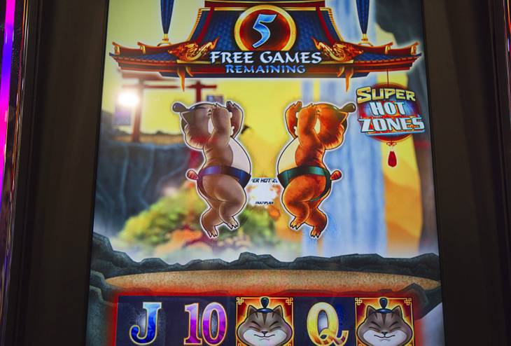 Sumo Kittens battle to determine a game multiplier in a Bally Technologies bonus game during the Global Gaming Expo (G2E) at the Sands Expo Center Tuesday, Oct. 2, 2012.