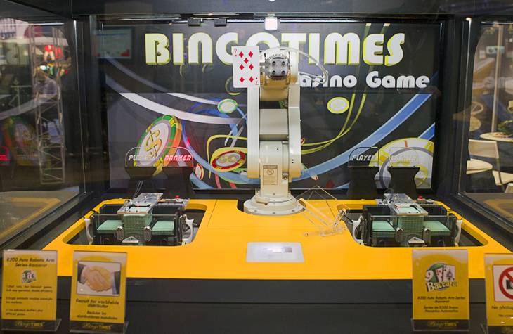 A robotic baccarat dealer is shown at the Bingo Times booth during the Global Gaming Expo (G2E) at the Sands Expo Center Tuesday, Oct. 2, 2012.