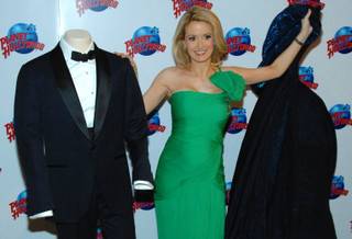 Holly Madison unveils the Tom Ford tuxedo worn by Daniel Craig in the next James Bond film 