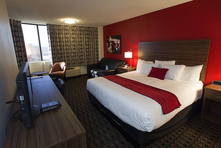 A renovated corner room with a king-size bed is shown at the D Las Vegas in downtown Las Vegas Tuesday, Oct. 9, 2012. The casino, formerly Fitzgeralds, is celebrating it's rebranding and renovation with festivities this weekend.
