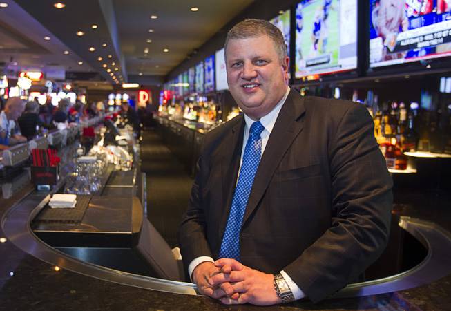 Derek Stevens, CEO of the D Las Vegas, poses at the casino's Long Bar in downtown Las Vegas Tuesday, Oct. 9, 2012. The casino, formerly Fitzgeralds, is celebrating it's rebranding and renovation with festivities this weekend.