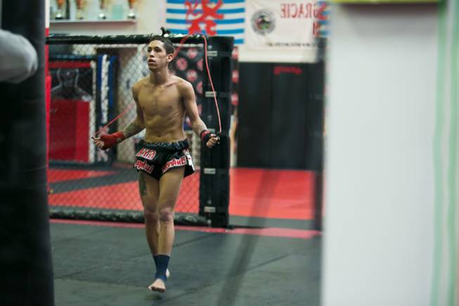 Muay Thai fighter Anthony Castrejon trains at One Kick's Gym for his October 13th fight against Andy Singh, Tuesday Oct. 9, 2012.