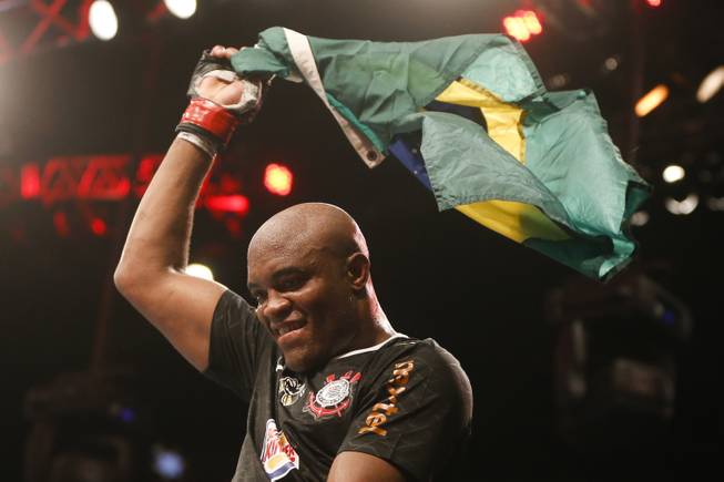 Anderson Silva, from Brazil, celebrates after defeating Stephan Bonnar, from the United States, during their light heavyweight mixed martial arts bout at UFC153 in Rio de Janeiro, early Sunday, Oct. 14, 2012.