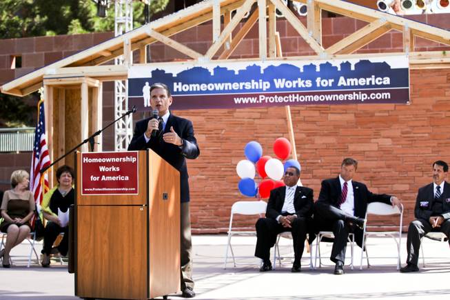 Rep. Joe Heck addresses a homeownership rally outside at the Clark County Government Center Amphitheater in Las Vegas Thursday, Oct. 18, 2012.