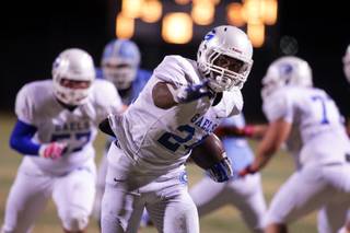 Nathan Starks of Bishop Gorman runs with the ball during their game at Centennial High School in Las Vegas on Friday, October 19, 2012.