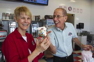 Owners Robin and Irving Dobbs pose with frozen custard at Rita's Green Valley, a custard and Italian ice shop in Henderson, Sunday, Oct. 21, 2012. Rita's, on Stephanie Street just north of Sunset Road, is the first Nevada franchise of a popular East Coast chain that originated in Bensalem Township, Penn.