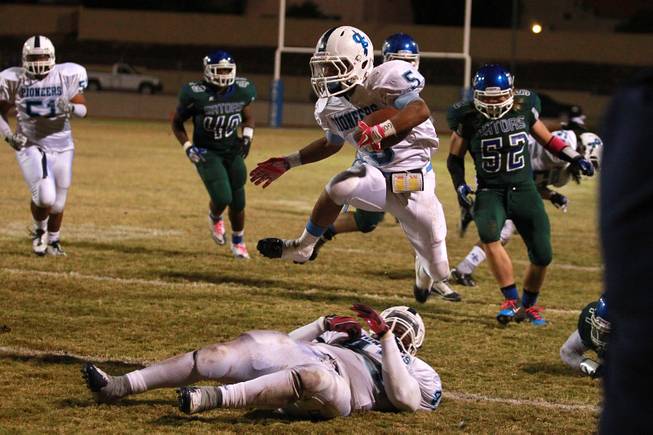 Canyon Springs running back Donnel Pumphrey leaps over a teammate during their game against Green Valley  Thursday, Oct. 25, 2012. Green Valley won 33-32 on a last-second field goal.