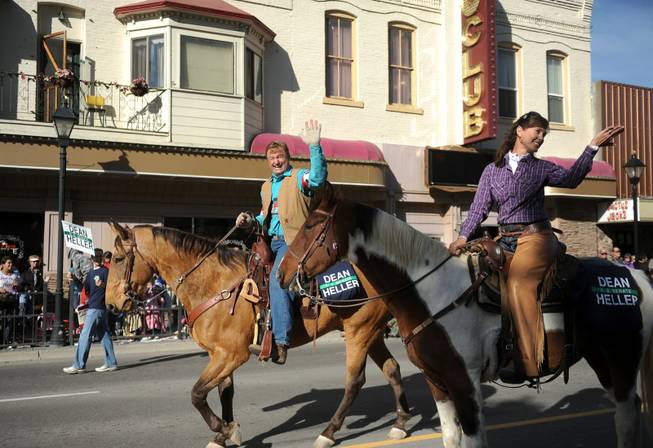 Senator Dean Heller and his wife Lynn, ride horses during the Nevada Day Parade Saturday, Oct. 27, 2012 in Carson City.