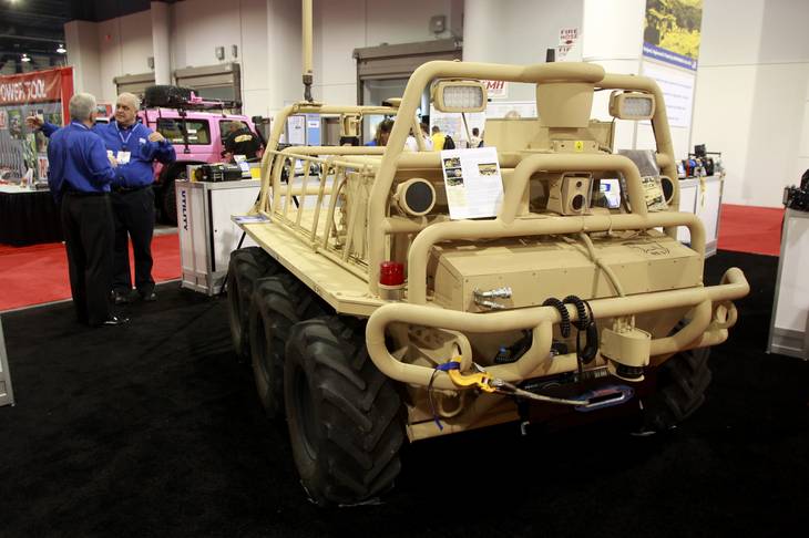 A Squad Mission Support System (SMSS) vehicle is seen on display at the SEMA show Tuesday, Oct. 30, 2012. The vehicle can be deployed remotely or via programming and is used to carry cargo for ground troops. The unit was on display at the Superwinch booth because it utilizes one of the company's winches. 