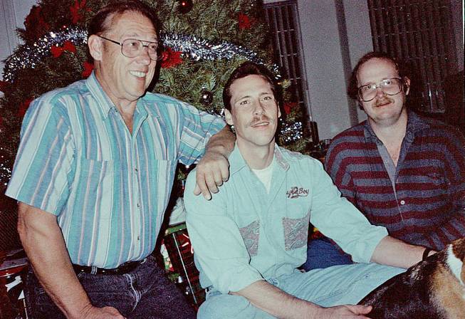 John E. Feathers, right, who died in February, left behind a vast map collection that will be donated to the Los Angeles Public Library. Here, he is shown with his father, John Feathers, left, and his brother, Bradley Feathers, in 1993. 
