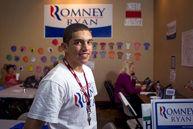 Tommy Bonetti, 16, a volunteer for the Mitt Romney for President campaign, poses in a Henderson field office Monday, Nov. 5, 2012.